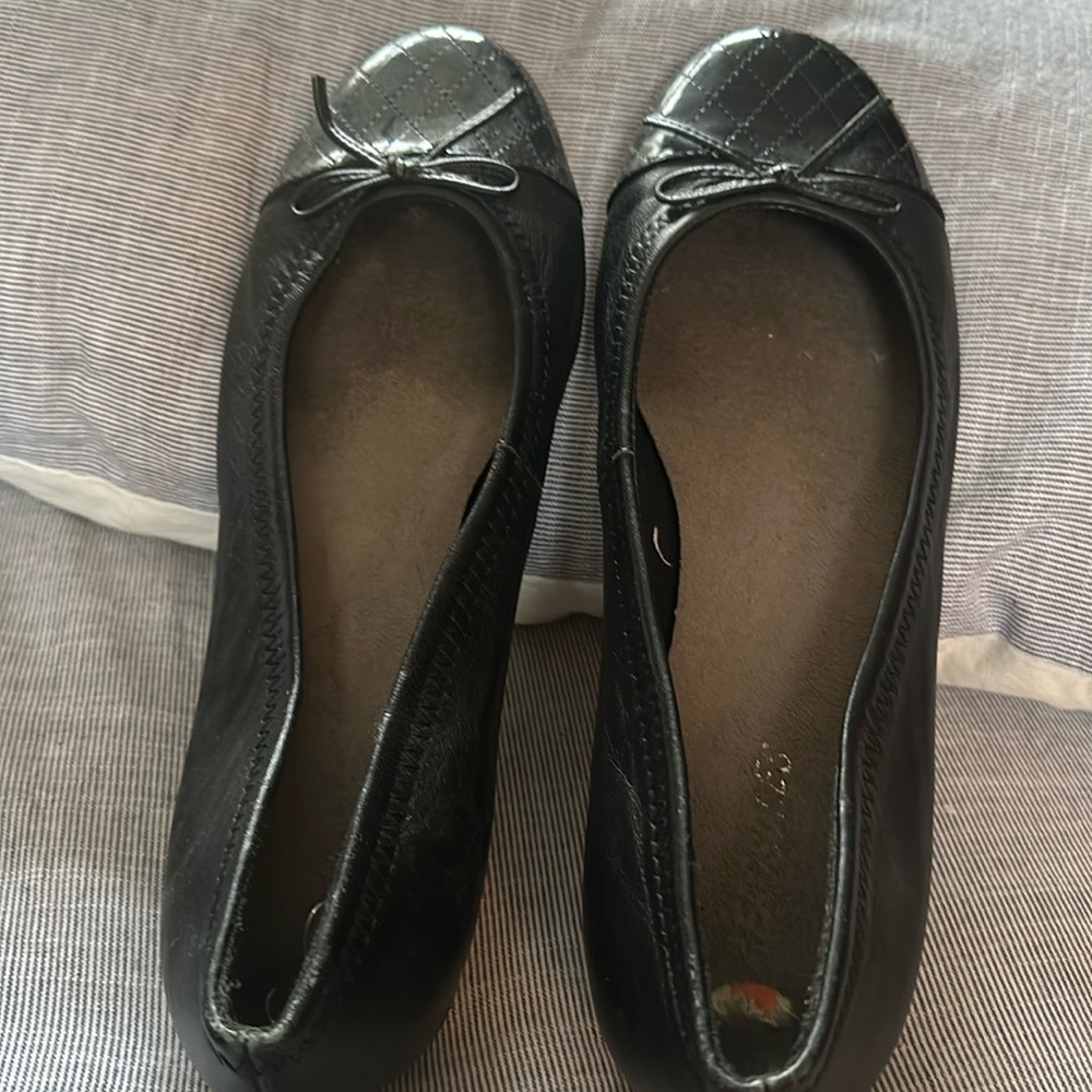 Black leather ballet flats